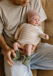 Hvid mitwachsender Baby Merino Strickpullunder Harvey cream apricot