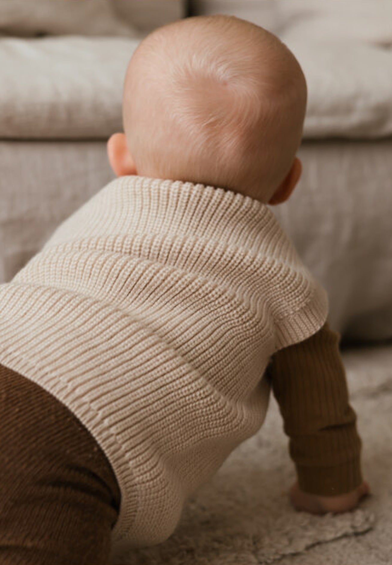 Hvid mitwachsender Baby Merino Strickpullunder Harvey in sand