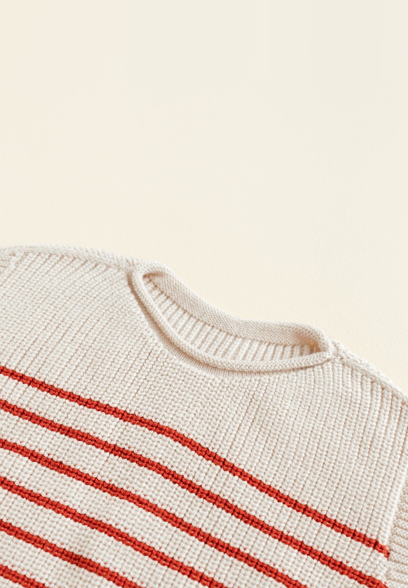 Hvid mitwachsender Baby Merino Strickpullunder Harvey cream rot
