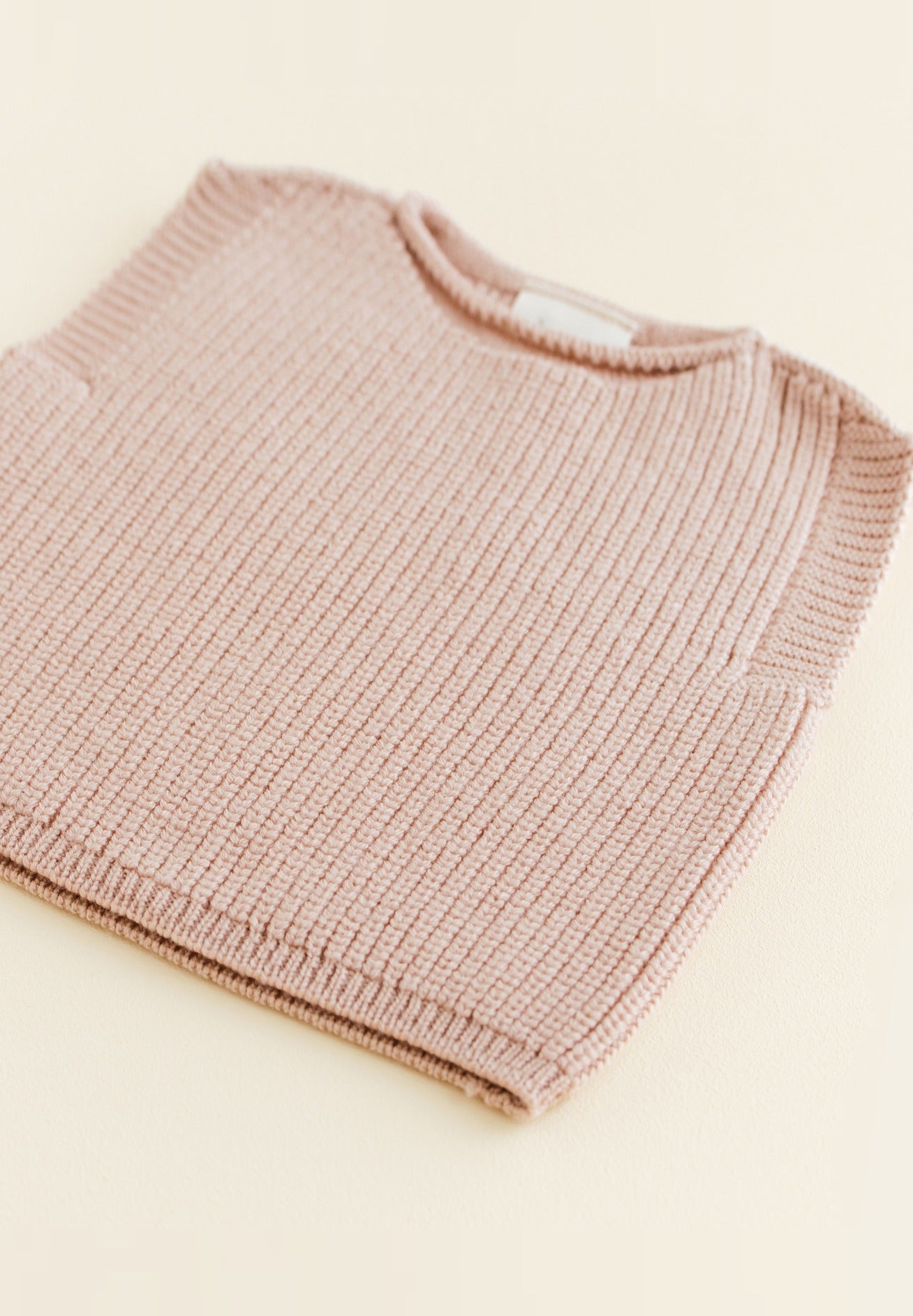 Hvid mitwachsender Baby Merino Strickpullunder Harvey in apricot