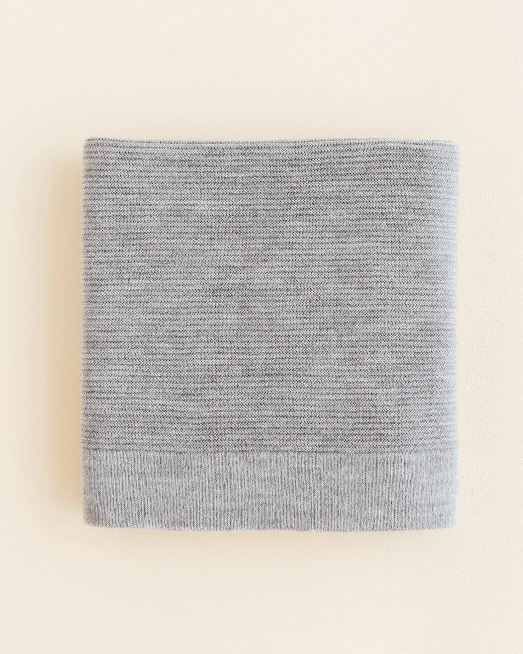 hvid_merinodecke_decke-grau-merino.webp
