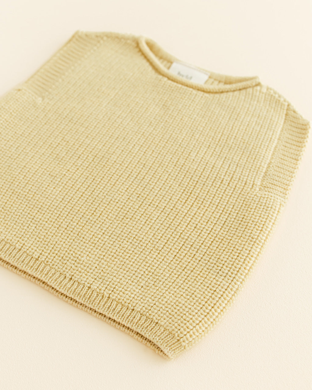 Hvid mitwachsender Baby Merino Strickpullunder Harvey in light yellow