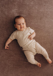 Wooly organic Tencel Leinen mitwachsender Wickelbody kurzarm ecru melange